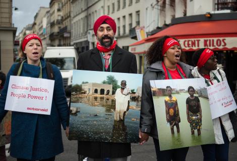 A photo of people protesting for action on climate change